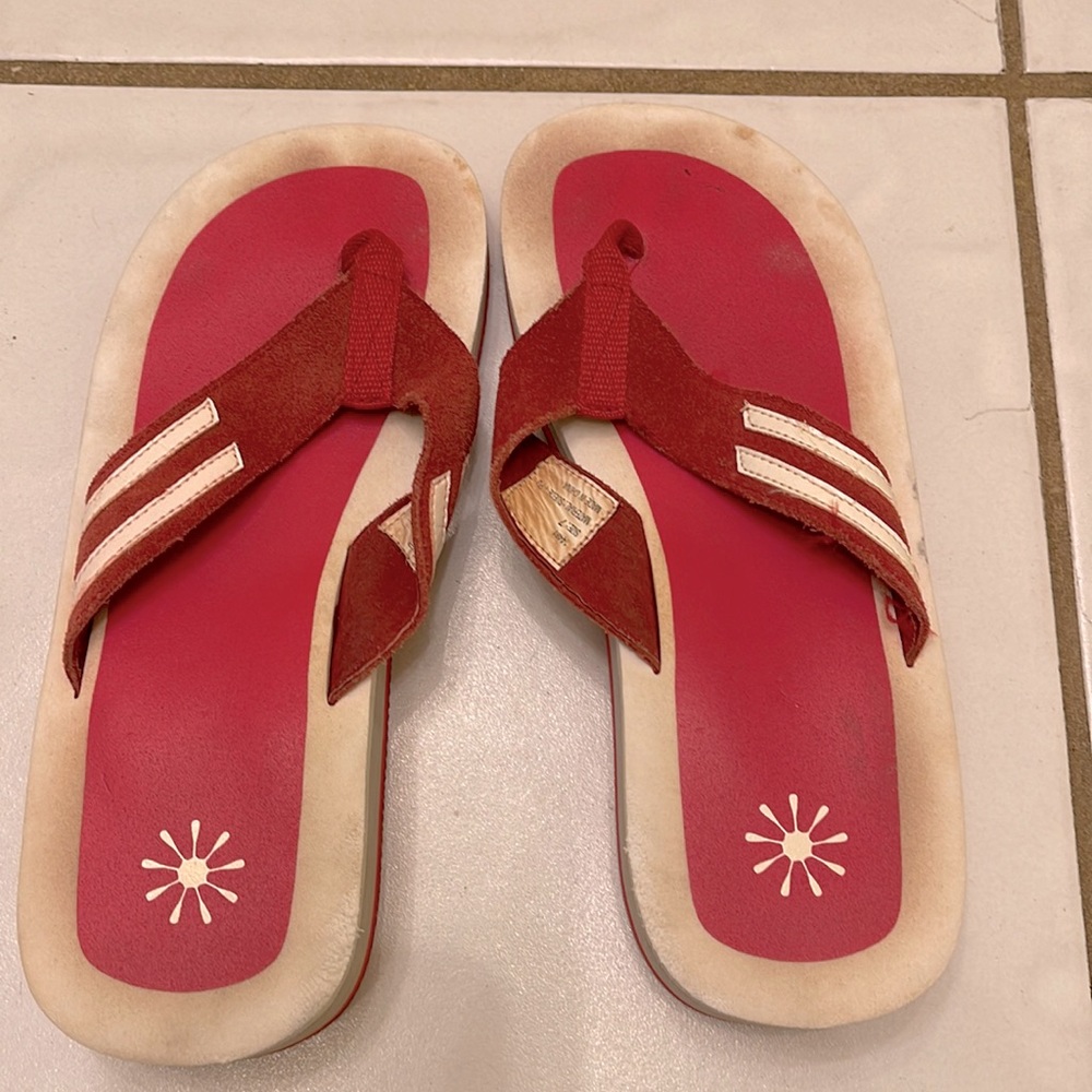 Red and white platform flip flops with suede band